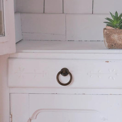 Two Pack Vintage Drop Ring Drawer Pulls In Antique Bronze For Dresser Cabinets And Doors Retro Cabinet Knobs And Handles installed on white drawer