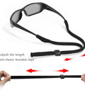 Black glasses strap with adjustable length, shown with sports sunglasses, highlighting elastic nylon/spandex material