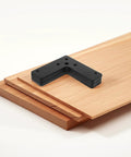 Black Stainless Steel L Shaped Corner Braces Set Of 10 atop wooden boards for reinforcement