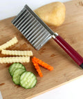 Two-pack French fry crinkle cutter set with red-handled wavy blade for potatoes and vegetables