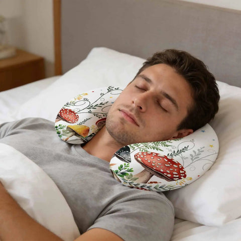 Man resting with U Shaped Memory Foam Travel Pillow For Airplane And Car, Ergonomic Neck Support, Cozy Mushroom And Butterfly Plant Design