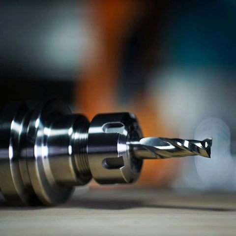 Close-up of SpeTool upcut spiral CNC router bit with 1/2 in shank and 1/2 in cutting diameter, solid carbide