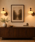Cozy living space featuring 2 Pack Rechargeable Vintage Wooden Wall Sconces RGB Battery Operated Lights beside framed art.