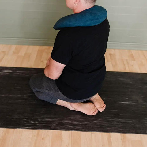 Person kneeling on XL Rubber Yoga Mat 78 Inch By 28 Inch Storm Color With Dual Sided Non Slip Grip facing away