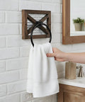 Rustic Farmhouse Toilet Paper Holder And Towel Holder Set Wall Mounted With Weathered Wood Finish And Black Metal Hardware in bathroom