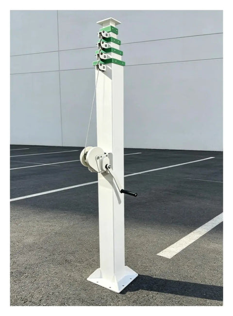 9 Meter Telescopic Mast With Double Steel Cable Hand Winch Manual Pump Hoist For Signal Antennas And Outdoor Lights, standing in a parking lot.