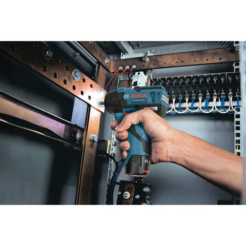 Using 12V Max Brushless Three Eighths Inch Impact Wrench Bare Tool Ultra Compact Five Point Five Inch Head Lightweight One Point Six Pound Tool for electrical work inside a panel box.
