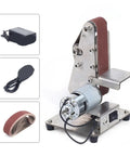 Compact Mini Electric Belt Sander And Polisher For Wood And Metal showing stainless steel build and sanding belt.