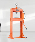 Pro Crew Badass 30 Ton H Frame Hydraulic Shop Press With Heavy Steel Platen And Automatic Relief Valve For Swapping Car Bushings Ball Joints Garage Metalwork Setup in orange color.