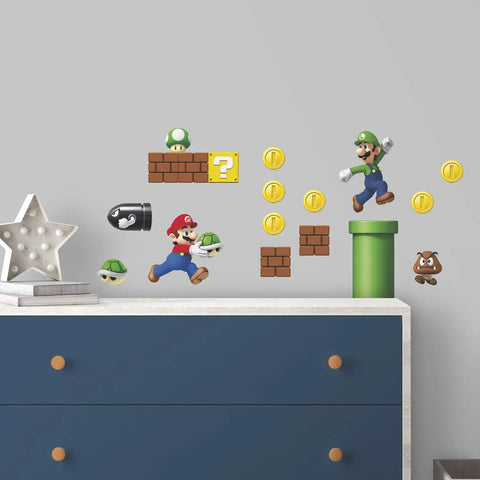 Nintendo New Super Mario Bros Build A Scene Peel And Stick Wall Decals Set with Mario, Luigi, pipes, and coins on a dresser