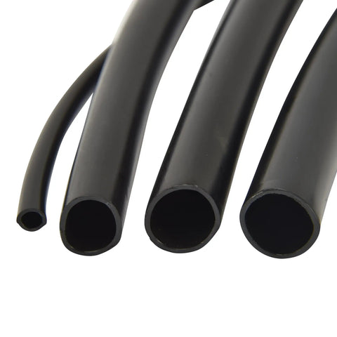 Close-up of 1/4-Inch Drip Irrigation Tubing, 50 Feet Black Polyethylene, showing cross-section of tubes in various sizes.