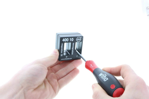 Person using Compact Magnetizer Demagnetizer Tool In Durable Shatterproof Case Is A Pro Grade Pick For Handling Fasteners