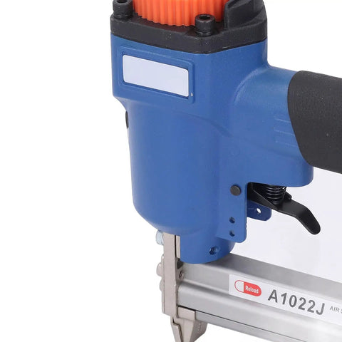Close-up of Sleek Lightweight Pneumatic Brad Nailer Badass Aluminum Build, showing the grip and loading mechanism.