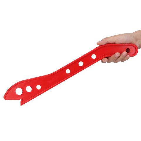 Hand holding ABS Push Stick for Table Saw and Router Tables, red, durable safety push block for carpentry"
