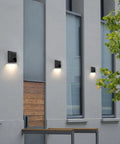 Outdoor Wall Light 8W LED Waterproof Sconce for Front Porch Patio and Garage Modern Black Finish on exterior wall