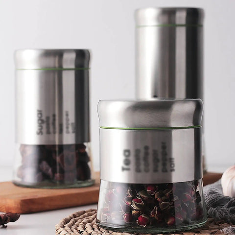 600 Milliliter Airtight Glass Coffee Storage Jar With Stainless Steel Lid Locks In Aroma For Beans Grounds Tea And Nuts on kitchen counter.