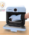 Top Shelf Heat Resistant Silicone Gloves For Sublimation Printing Non Slip Cotton Lined 2 Pack Blue insulated gloves in use for handling a tumbler.