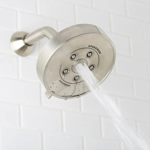 Neo Anystream 3 In 1 Shower Head With Self Cleaning Plungers Brushed Nickel Finish 2.5 GPM in use against white tile