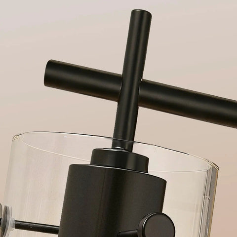 Close-up of matte black fixture and clear glass shade on Three Light Matte Black Vanity Light With Clear Glass Shades For Bathroom Mirror Over Vanity And Beyond Perfect Wall Sconce For Bedroom Living Room Hallway.