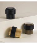 Stylish Knurled Brass Floor Mount Door Stopper With Non Magnetic Bumper Catch Holder To Block Doors And Protect Walls In Your Home, showing black and brass finishes.