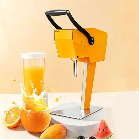 Heavy Duty Electric Citrus Juicer With Three-Blade Steel Cutter Head For High Yield And Quick Press Operation Detachable Design placed beside fresh fruit and juice.