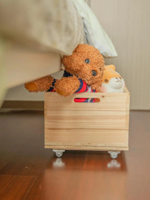 1 Inch Rigid Caster Wheels 4 Pack Non Swivel Single Direction Low Profile Silent TPE Rubber in a toy storage box under bed