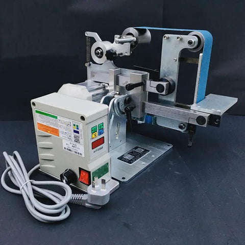 Heavy Duty 750W Brushless Belt Grinder A Real Garage Workhorse Built Tough In Rock Solid Steel Frame Forward Reverse Toggle Versatile Benchtop Sander And Polishing Kit with motor and blue sanding belt.