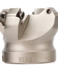 Front view of silver face milling cutter head with two clamp screws and curved insert pocket.