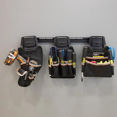 Tradesman Pro Modular Drill Pouch With Belt Clip for Click Lock System on modular wall rack holding tools.