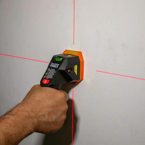 Electronic Stud Finder Pro Grade Ultra Handy With Cross Line Lasers, Bubble Level And LED And Audio Alerts For Wood And Metal Studs, Class 3R Laser 15 Feet In All Directions, Batteries Included on wall