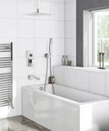 Modern bathroom with Ceiling Mount Shower System With 12 Inch Rainfall Head, Handheld Spray, and Waterfall Tub Spout in polished chrome.