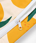 Close-up of zipper and orange strawberry print on Waterproof Wet Bag For Swimsuits And Travel, Large 26x32 Cm With Handle.
