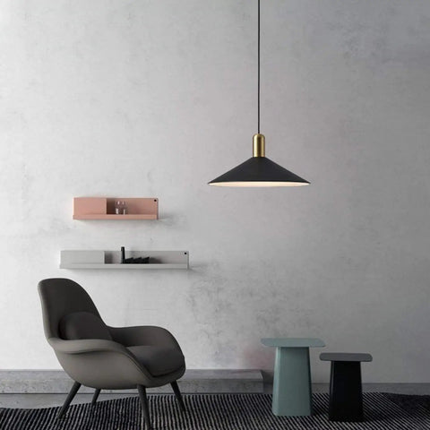 Dope Farmhouse Matte Black Barn Pendant Light With Brass Accents hanging in modern living room, cone shape, white interior.