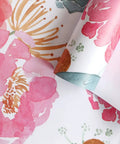 Close-up of Removable Peel And Stick Floral Wallpaper With Cactus Pink Navy Pattern Easy Stick And Go Self Adhesive, rolled edge.