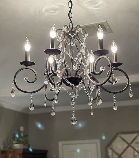 Bronze Crystal Six Light Candle Chandelier With Metal Pendant Ceiling Light, vintage bronze finish, hanging in a room view
