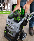 Person inserting battery into Dual 56V Battery Electric Pressure Washer With 3200 Psi Turbo Power And 2.0 Gpm Beast Mode Cleaning