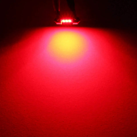 Super Bright Red DE3021 31mm Festoon LED Bulbs 6 SMD 3030 illuminating a red glow, 500 Lm, for interior car lighting