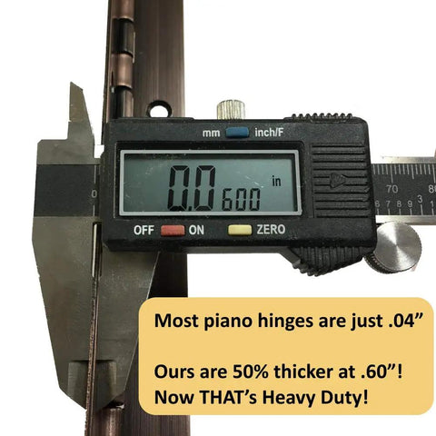 Close-up of a caliper measuring .060 in thickness of Rock Solid 1.5 In X 48 In Continuous Piano Hinge Built Tough With.060 Thick Steel.