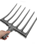 Heavy Duty Steel Garden Fork For Soil Loosening And Planting Area Prep in hand, rugged multi-purpose farm tool head, quick attach design