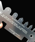 Close-up of a stainless steel tool from the Stainless Steel Model Ship Tank Multitool Kit With Tube Bender, Folding Tool, Auxiliary Ruler, And Vices