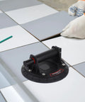 Heavy Duty Glass Suction Cup Lifter With Quick Release Handle For Moving Granite, Ceramic Tile, And Sheet Metal Safely on tile surface.