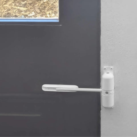 KC10HD Self Closing Door Closer Kit With Spring Loaded Mechanism for hinged doors installed on white surface