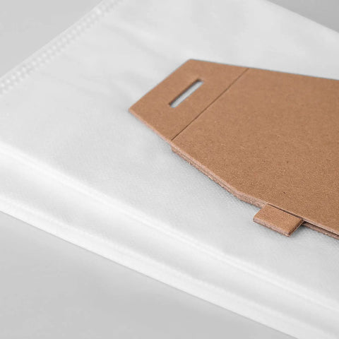Close-up of 6 Pack Replacement Type Q HEPA Vacuum Bags For Hoover Platinum Upright UH30010 showing white material and cardboard top