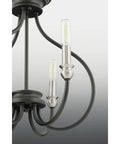 Close-up of Whisp Collection 4 Light Farmhouse Chandelier In Graphite Black Finish With Candled Scroll Frame Classic Yet Modern Ceiling Light