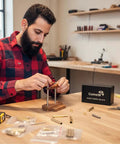 Man crafting with Ten Pack Woodturning Pen Kits Titanium Silver Finish With Bonus Ten Covers And Dope Black Ink Ballpoint Slimline Rollerball Twist Set.