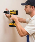 Tough As Nails 21v Cordless Drill Tool Kit used by a worker to screw into a wall, features ergonomic grip, and precision bits.