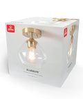 Harrow 1 Light Semi Flush Mount Ceiling Light In Matte Brass With Clear Glass Shade packaging on white background.