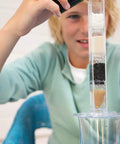 Child using Hands-On Desalination Kit For Kids And Teens A Cool Lab Grade Science Toy To Learn Climate Change Global Warming And Salt Removal From Seawater