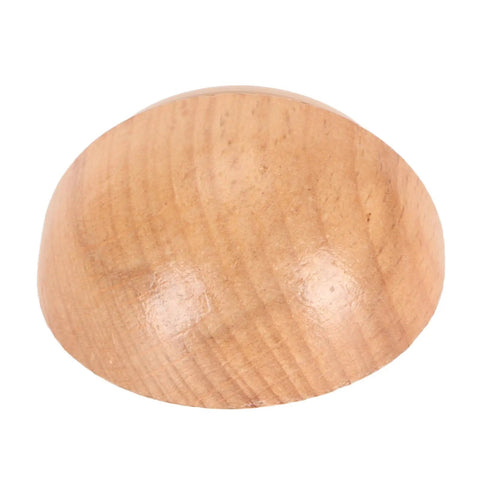 Round top view of heavy duty door stop with durable synthetic wood and silicone construction, ideal for preventing door slams.