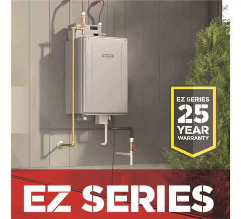 Mad Fast Instant Hot Water Flow Beige Natural Gas Tankless Water Heater mounted on wall with copper pipes and warranty sign.
